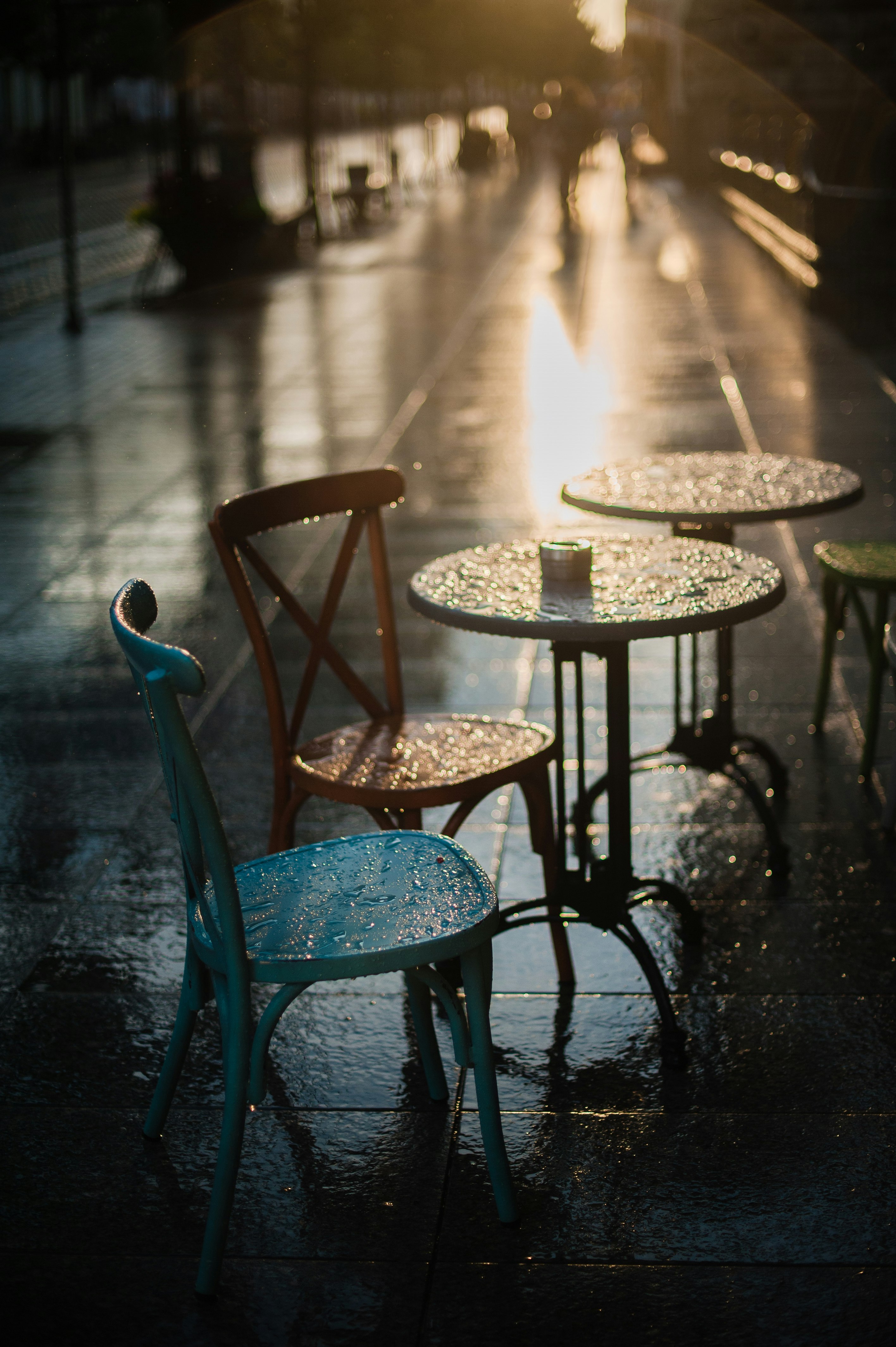 black metal round table with chairs